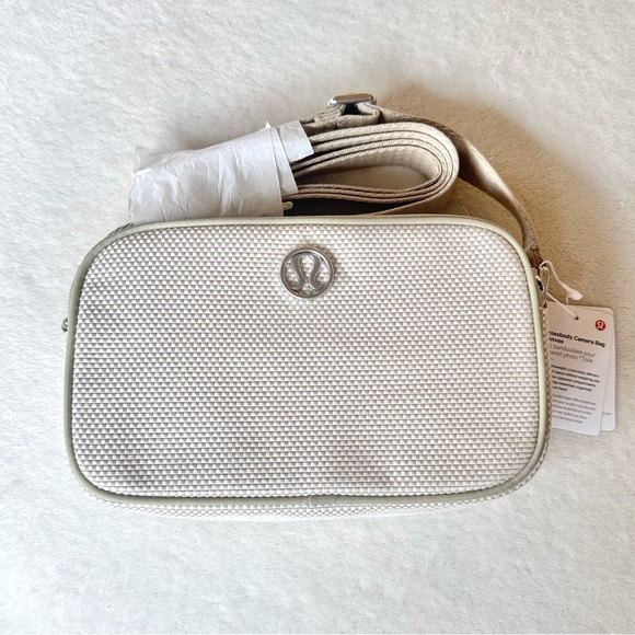lululemon athletica Handbags - NWT Lululemon Crossbody Camera Bag *Canvas – Movage Tan/Light Ivory/Raw Linen
